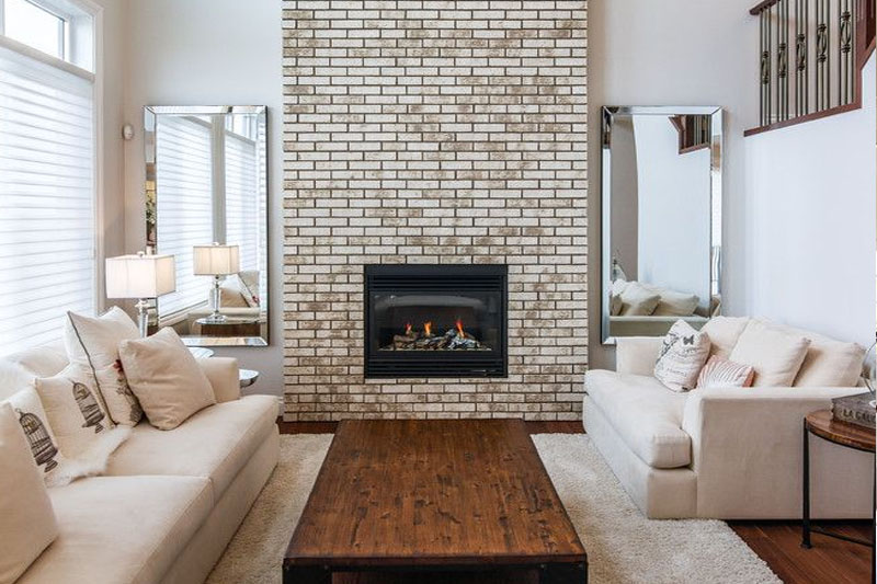 Long wall brick fireplace