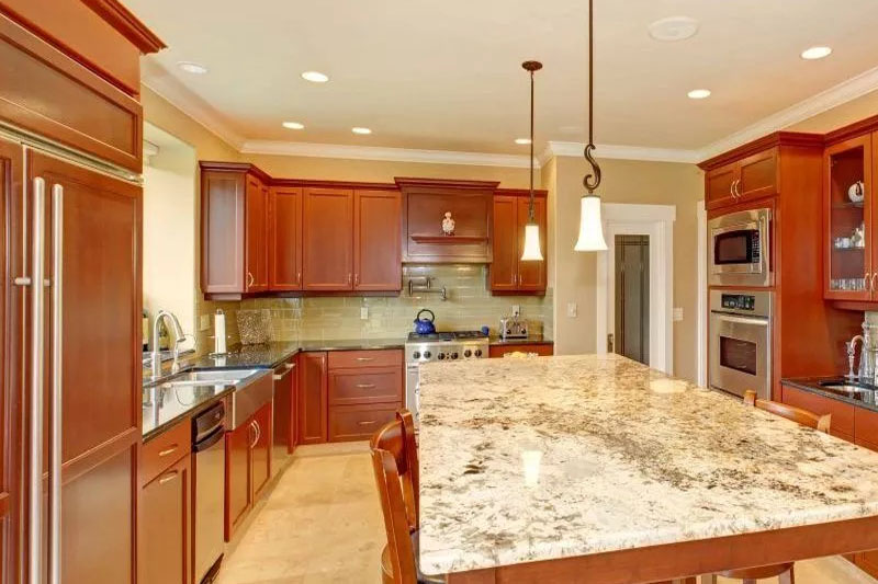 Quartz countertop with oak cabinet