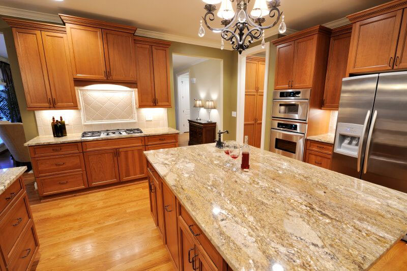Quartz countertops with oak cabinet