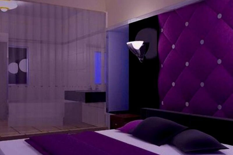 Two-toned purple bedroom wall