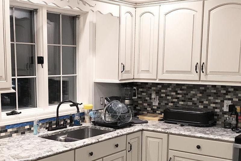 white cabinets and black hardware