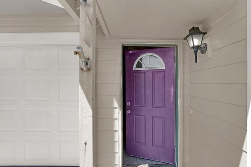 Purple door for beige home