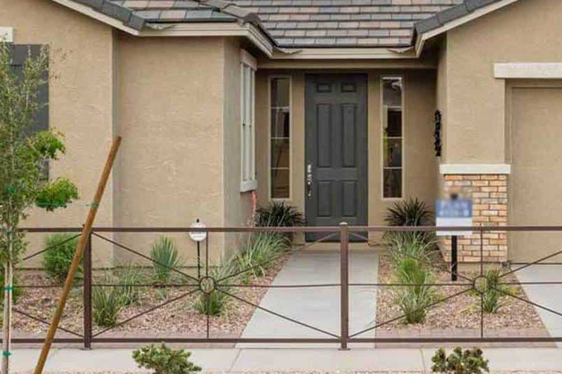 grey front door beige house